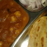 Chana Masala: Receita Indiana de Grão-de-Bico com Especiarias | Comidas Asiáticas: Curry chana masala de grão-de-bico com especiarias e molho de tomate